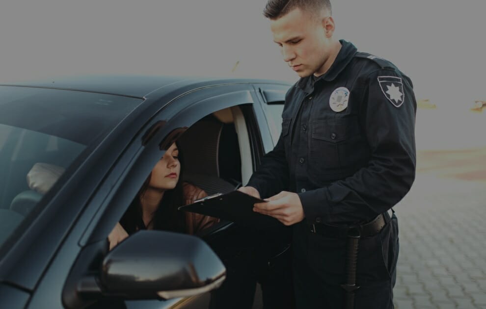 Police officer writing citation