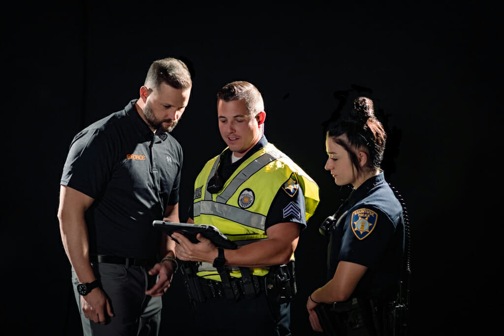 Officers using user-friendly mobile software for law enforcement