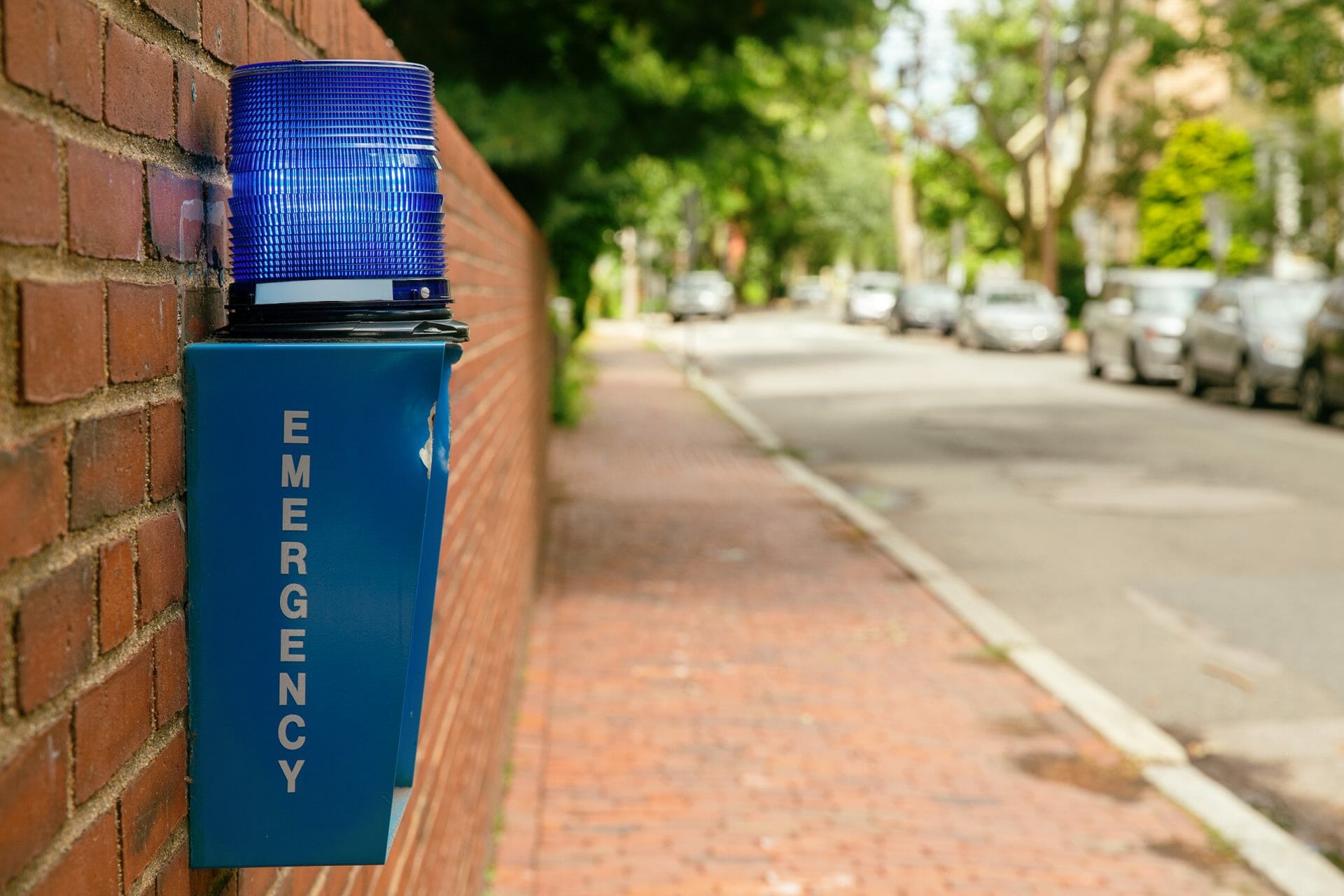 Emergency button outdoor in the city street.